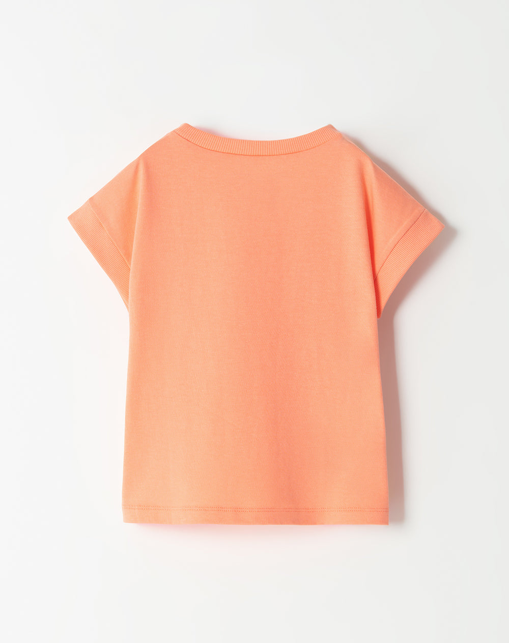 Camiseta oversized fit manga corta coral